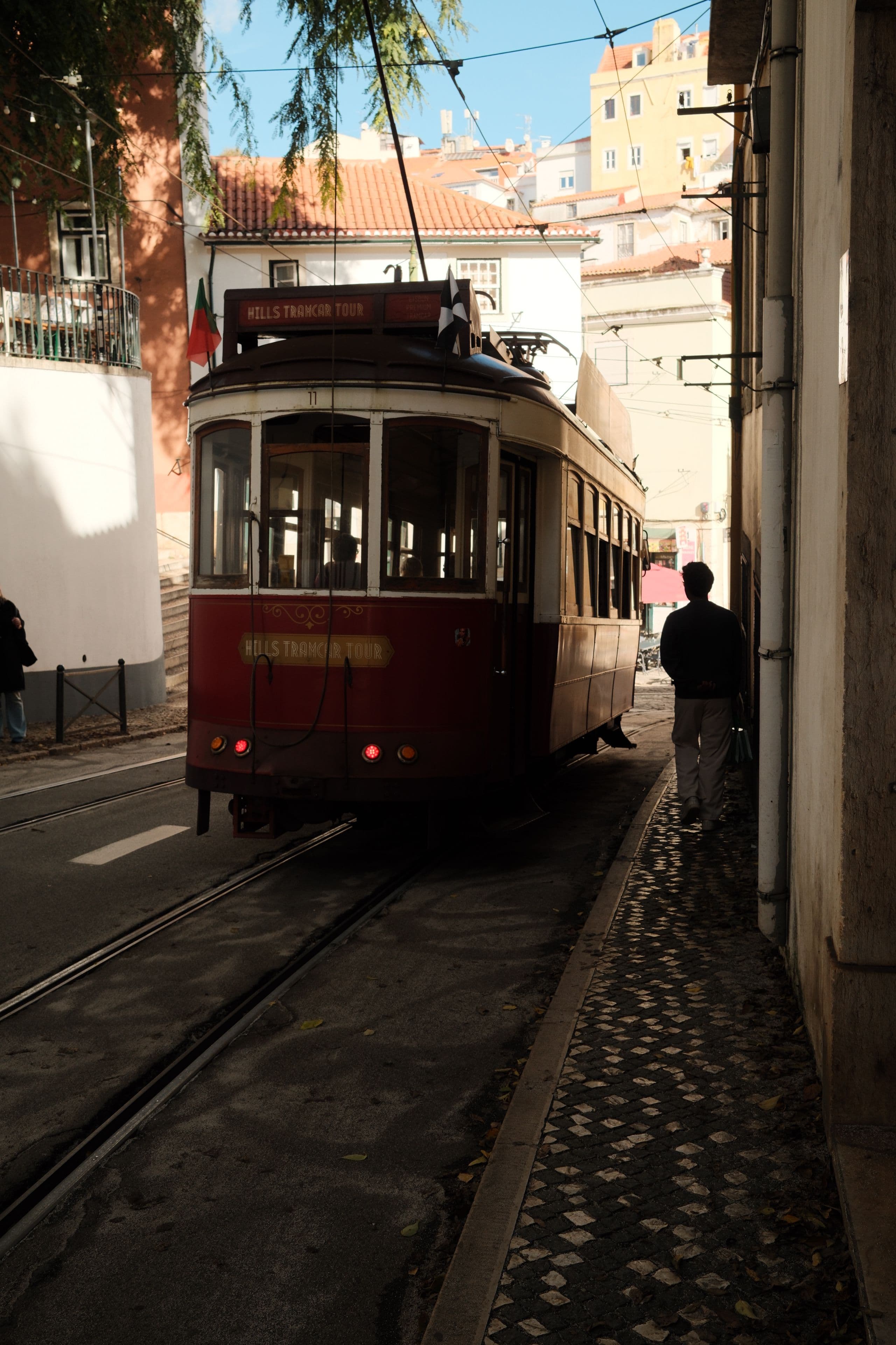 Tram passing through Alfama, Lisbon